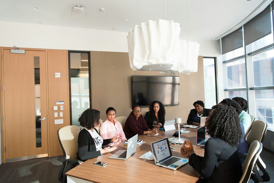 Team reviewing work in a meeting room